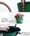 A striking green basket bag for adults