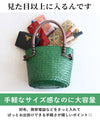 A striking green basket bag for adults