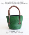 A striking green basket bag for adults