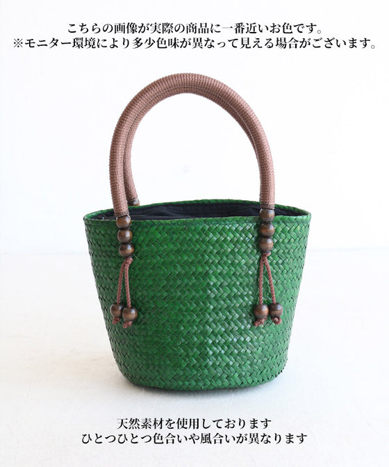 A striking green basket bag for adults