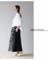 A three-dimensional tulle asymmetric skirt for an elegant and fashionable look