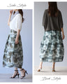 A fluffy cocoon skirt painted in fantastic watercolors