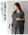 A cool and fashionable tunic that shows off healthy skin