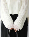 Layered beauty with lace and tulle sleeves