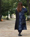 Outerwear made of different materials with striking dots