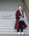 A sophisticated silhouette long coat for adults