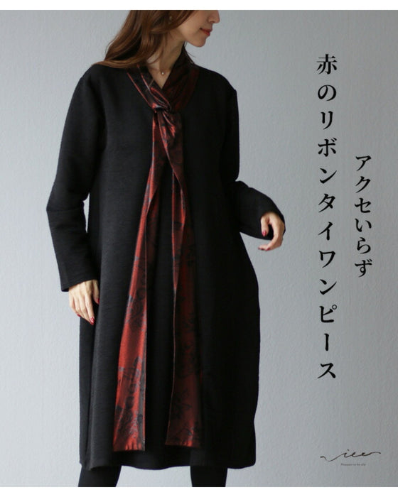 No accessories needed, just a red ribbon tie dress