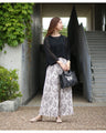 Instantly brighten up your look with these flower pleated pants