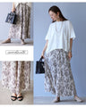 Instantly brighten up your look with these flower pleated pants