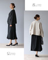 A collarless jacket that matches the Vieo dress
