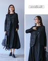 A rich black vest for a mannish look