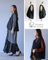 A rich black vest for a mannish look