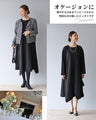 A beautifully shaped, fluttering black dress