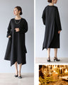 A beautifully shaped, fluttering black dress