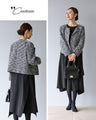 A beautifully shaped, fluttering black dress