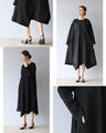 A beautifully shaped, fluttering black dress