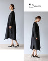 A beautifully shaped, fluttering black dress