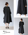 A beautifully shaped, fluttering black dress