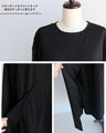 A beautifully shaped, fluttering black dress