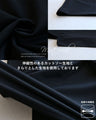 A beautifully shaped, fluttering black dress