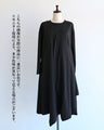 A beautifully shaped, fluttering black dress