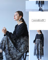 A monotone tulle dress that blends well with the rest