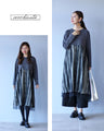 A monotone tulle dress that blends well with the rest