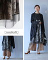 A monotone tulle dress that blends well with the rest