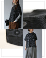 Relaxed top with floating circle pattern