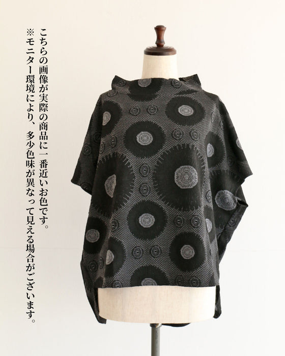 Relaxed top with floating circle pattern