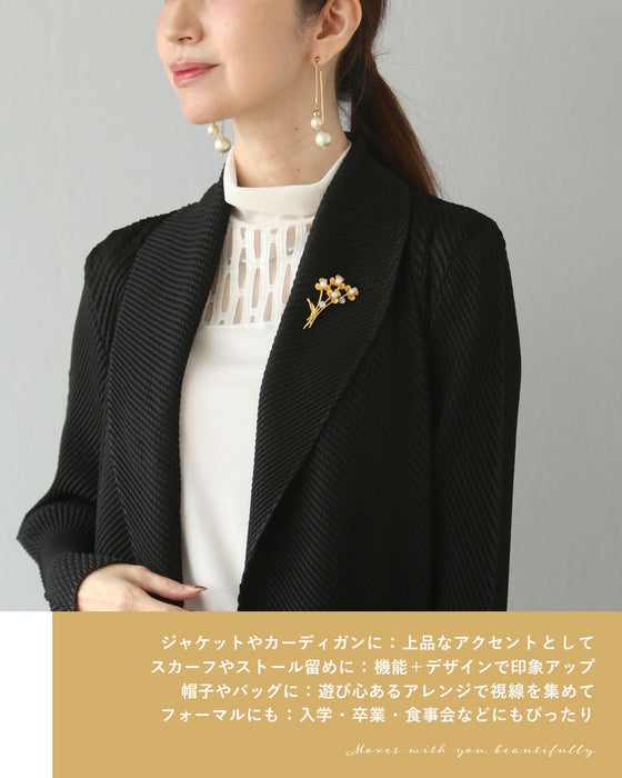 光をまとう花束ブローチ