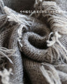 A beautiful, loose fringe knit that looks great
