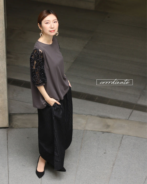 聡明な美しさを 華やぐトップス