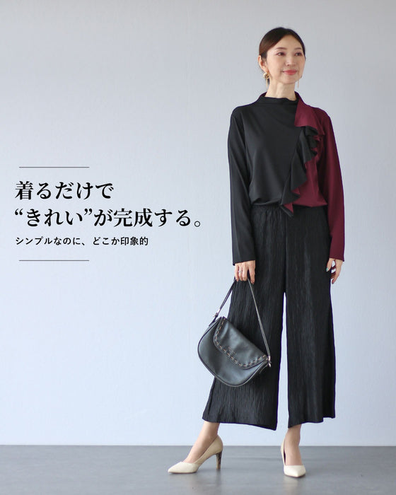 素材で差がつく 艶めく黒ワイドパンツ