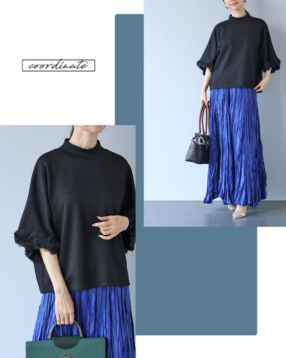 黒なのに華やぐ 立体薔薇の袖トップス