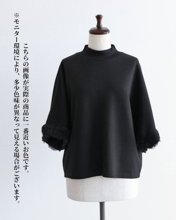 黒なのに華やぐ 立体薔薇の袖トップス