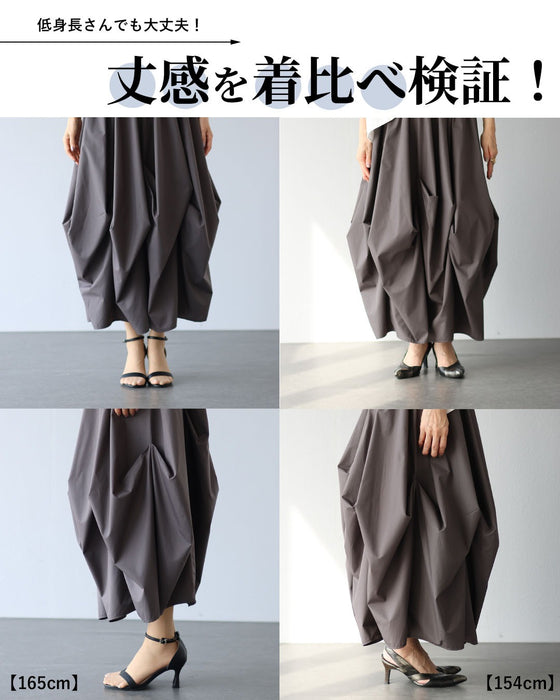 生地を遊ばせた、構築シルエット立体フォルムスカート