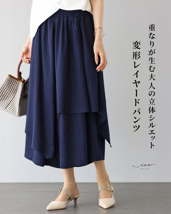 重なりが生む大人の立体シルエット変形レイヤードパンツ