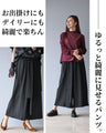 A striking black vest and pants outfit set