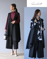 A striking black vest and pants outfit set