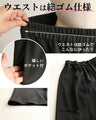 A striking black vest and pants outfit set