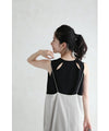 Sleeveless cut-and-sew top with delicate glitter