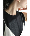 Sleeveless cut-and-sew top with delicate glitter