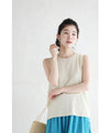 Sleeveless cut-and-sew top with delicate glitter
