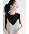 Sleeveless cut-and-sew top with delicate glitter