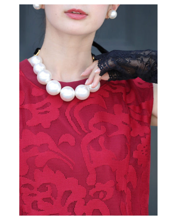 アラベスク模様浮き立つペプラムトップス