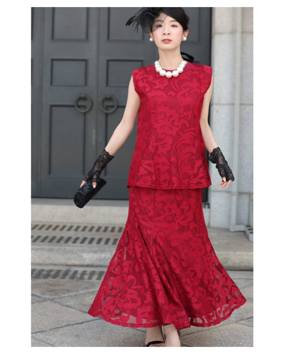 アラベスク模様浮き立つペプラムトップス