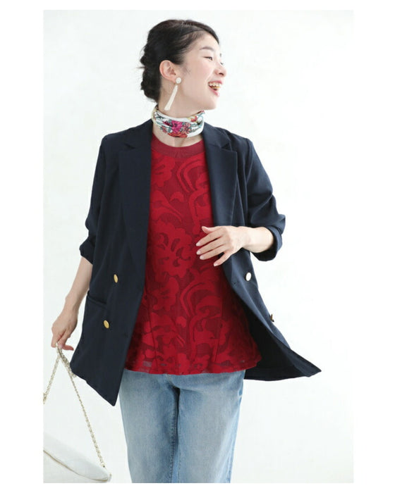 アラベスク模様浮き立つペプラムトップス