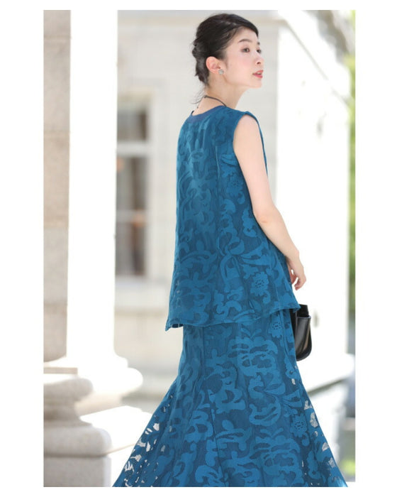 アラベスク模様浮き立つペプラムトップス