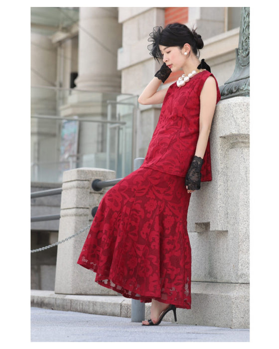 アラベスク模様浮き立つペプラムトップス